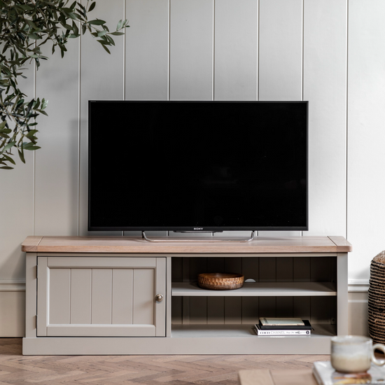 A Buckland Media Unit in Prairie finish with a wooden top, perfect for interior decor and home furniture.