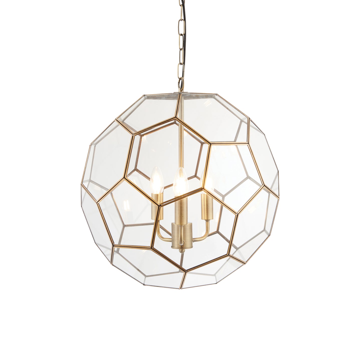 A Miele 3 Pendant Light Antique Brass and glass sphere pendant light for interior decor.