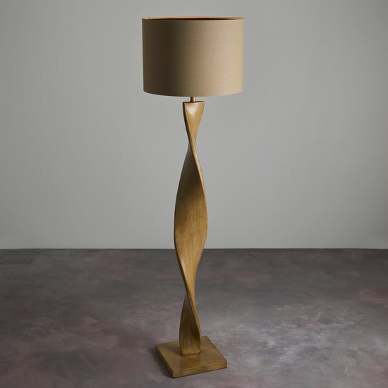An Ash Floor Lamp with a beige shade for home interior decor from Kikiathome.co.uk.