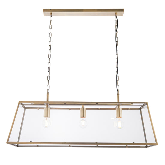 A Hurst 3 Pendant Light Antique Brass, perfect for interior decor and home furniture.
