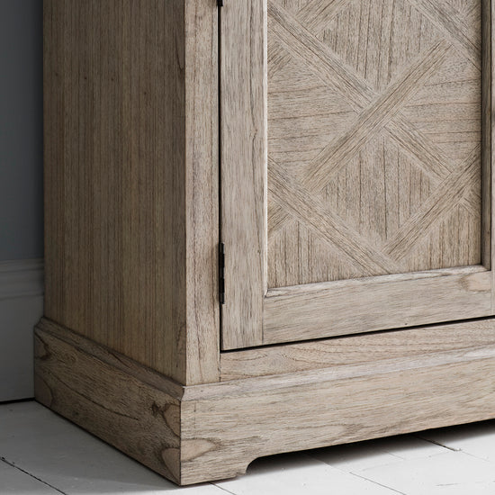 A Belsford 2 Door 3 Drawer Sideboard 1500x450x800mm with a geometric design on it for interior decor.