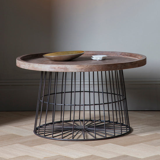 A Menzies Coffee Table 800x800x450mm from Kikiathome.co.uk with a wire basket on top, perfect for interior decor and home furniture.