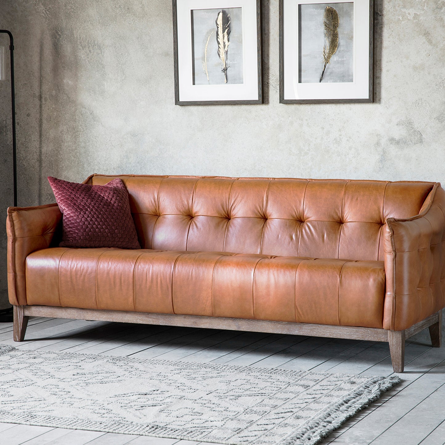 A Loddiswell Sofa in a living room, adding style and comfort to your interior decor.