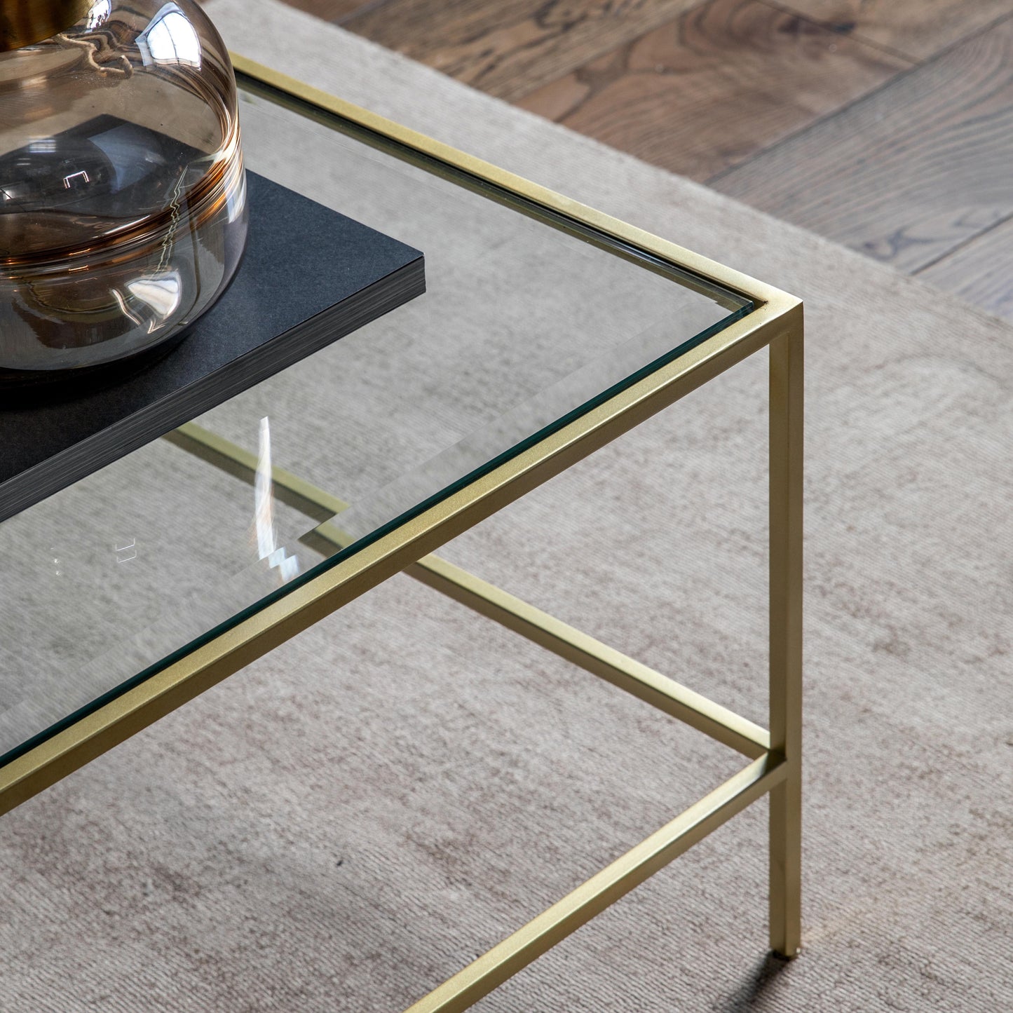 Engleborne Coffee Table Champagne with a gold frame - perfect for interior decor and home furniture.
