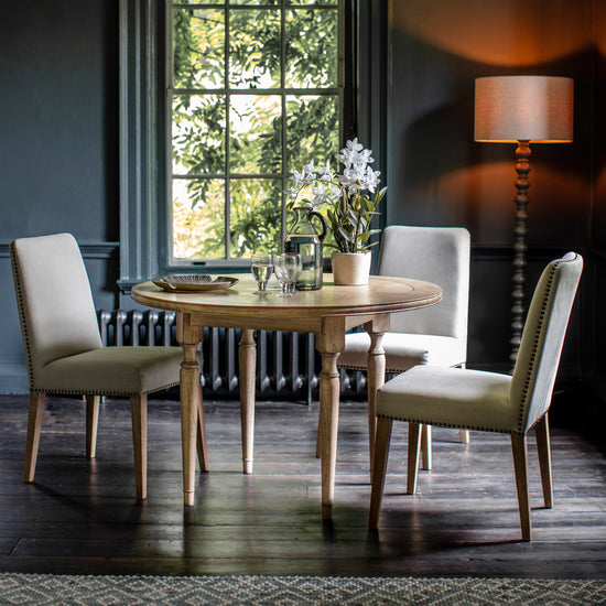 A dining room with home furniture and chairs from Kikiathome.co.uk.