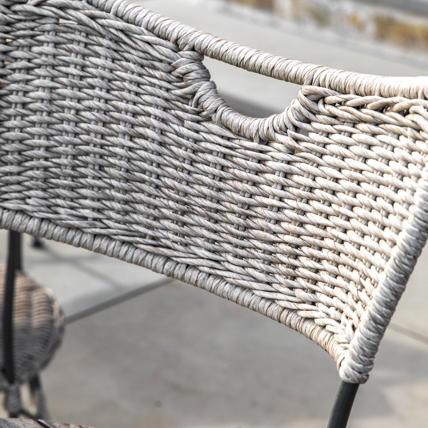 A close up of a Ashprington Dining Chair (2pk) by Kikiathome.co.uk on a patio, showcasing stylish home furniture.