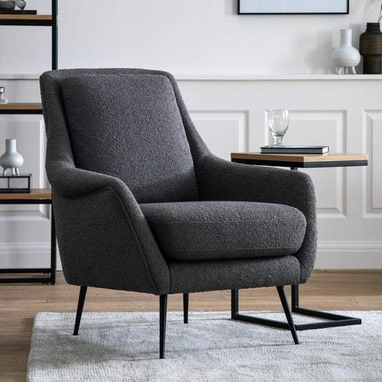An Interior decor Brompton Armchair Dark Grey Linen from Kikiathome.co.uk enhances the home furniture collection in a living room.