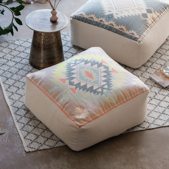 A pair of SG Haiti Global Dia Pouffe Multi 800x800x350mm pillows with a southwestern pattern, perfect for home furniture and interior decor.