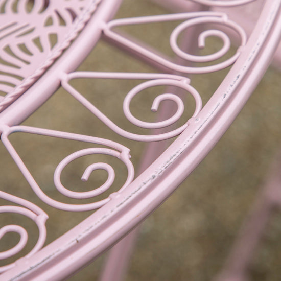 A close up of a Roborough 2 Seater Bistro Set Coral, a home furniture piece by Kikiathome.co.uk.