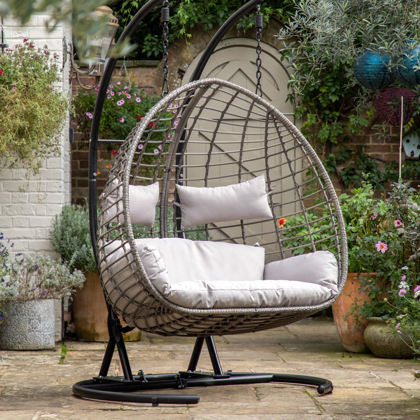 A Woodleigh Hanging 2 Seater Chair by Kikiathome.co.uk, a stylish addition to home furniture.