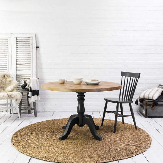 A Rustic Oak Round Table perfect for Home furniture and Interior decor.
