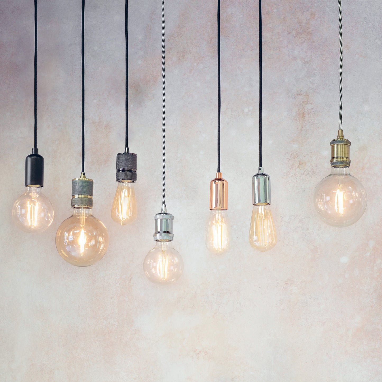 A group of light bulbs hanging on a wall.