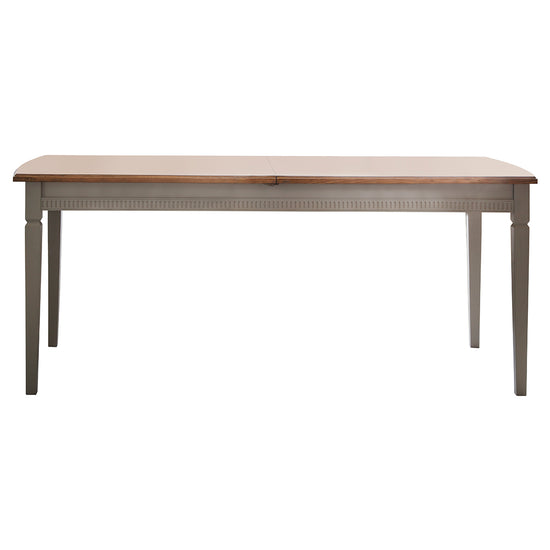A Ponsworthy Ext Dining Table with a wooden top for home furniture and interior decor from Kikiathome.co.uk.