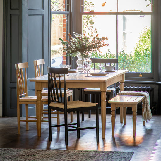 An interior decor showcasing a Buckland Extending Dining Table and chairs from Kikiathome.co.uk.