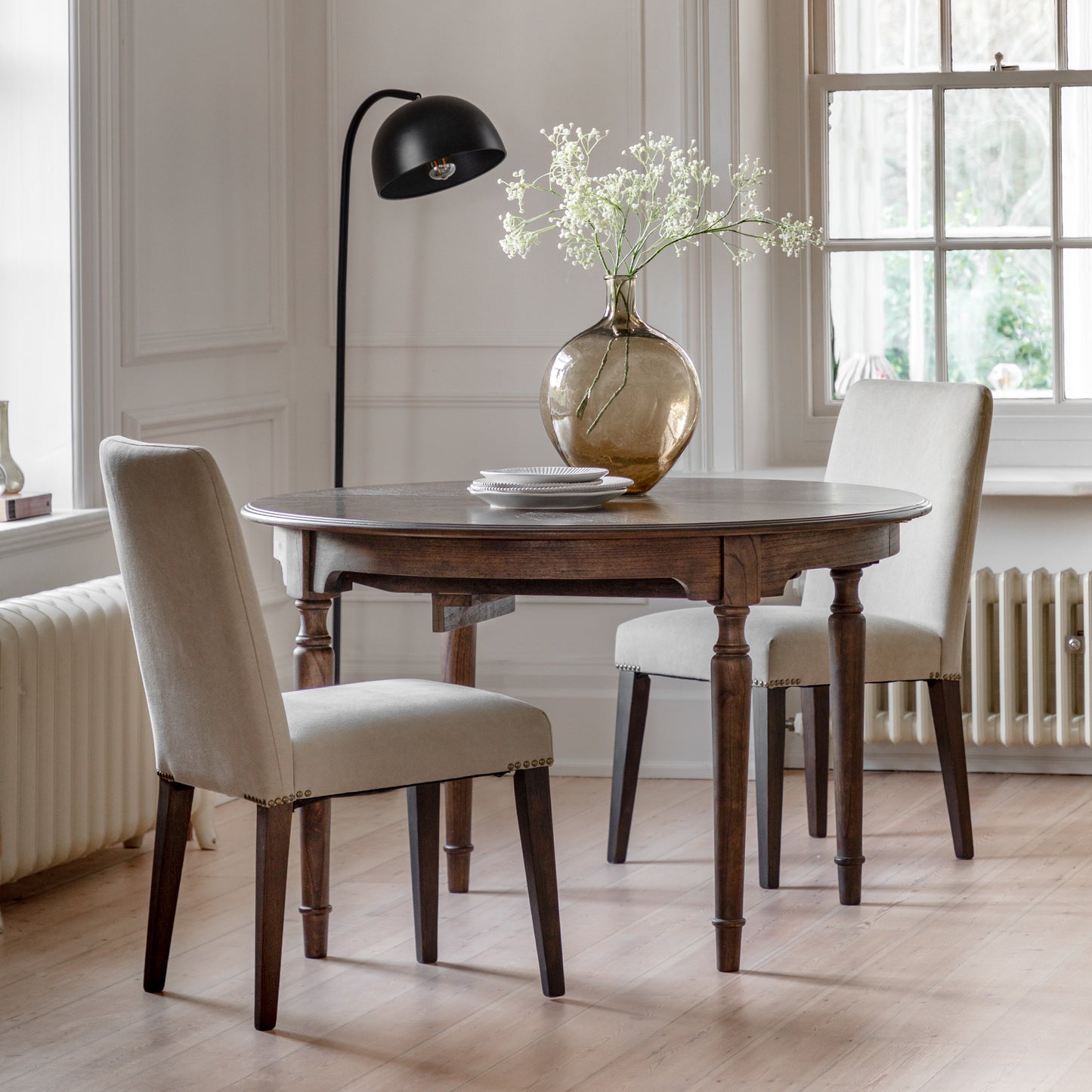 A dining room with stylish home furniture and interior decor from Kikiathome.co.uk.
