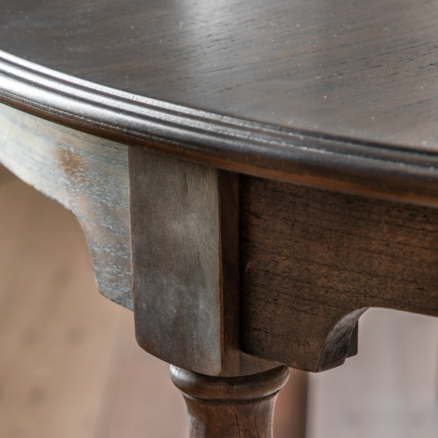 A close up of Kikiathome.co.uk's Manaton Extending Round Table, a home furniture piece perfect for interior decor.