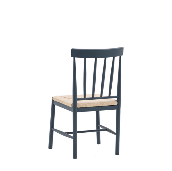 A Buckland Dining Chair 2pk in Meteor with a blue seat, perfect for interior decor.