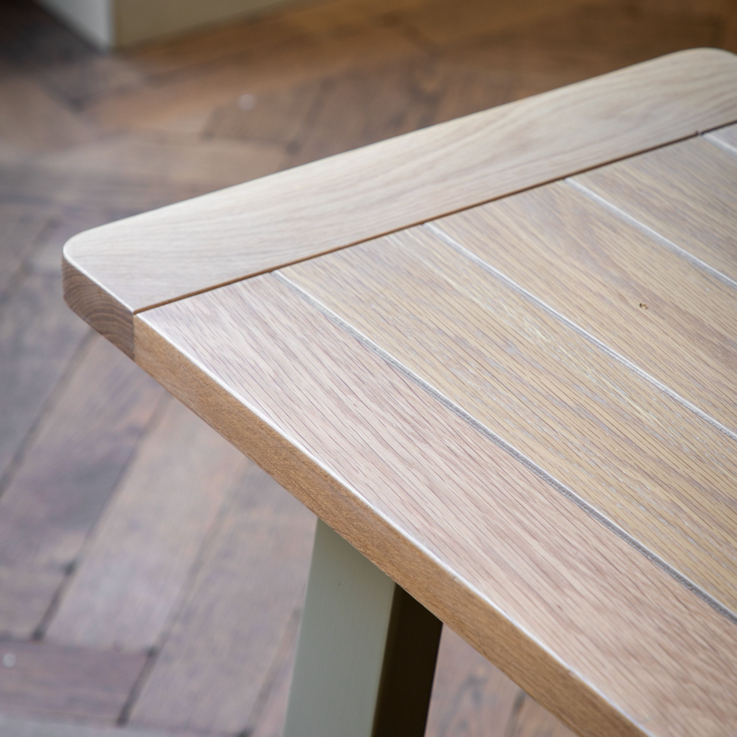 A close up of the Prairie Buckland Trestle Bench in Prairie by Kikiathome.co.uk for home furniture.
