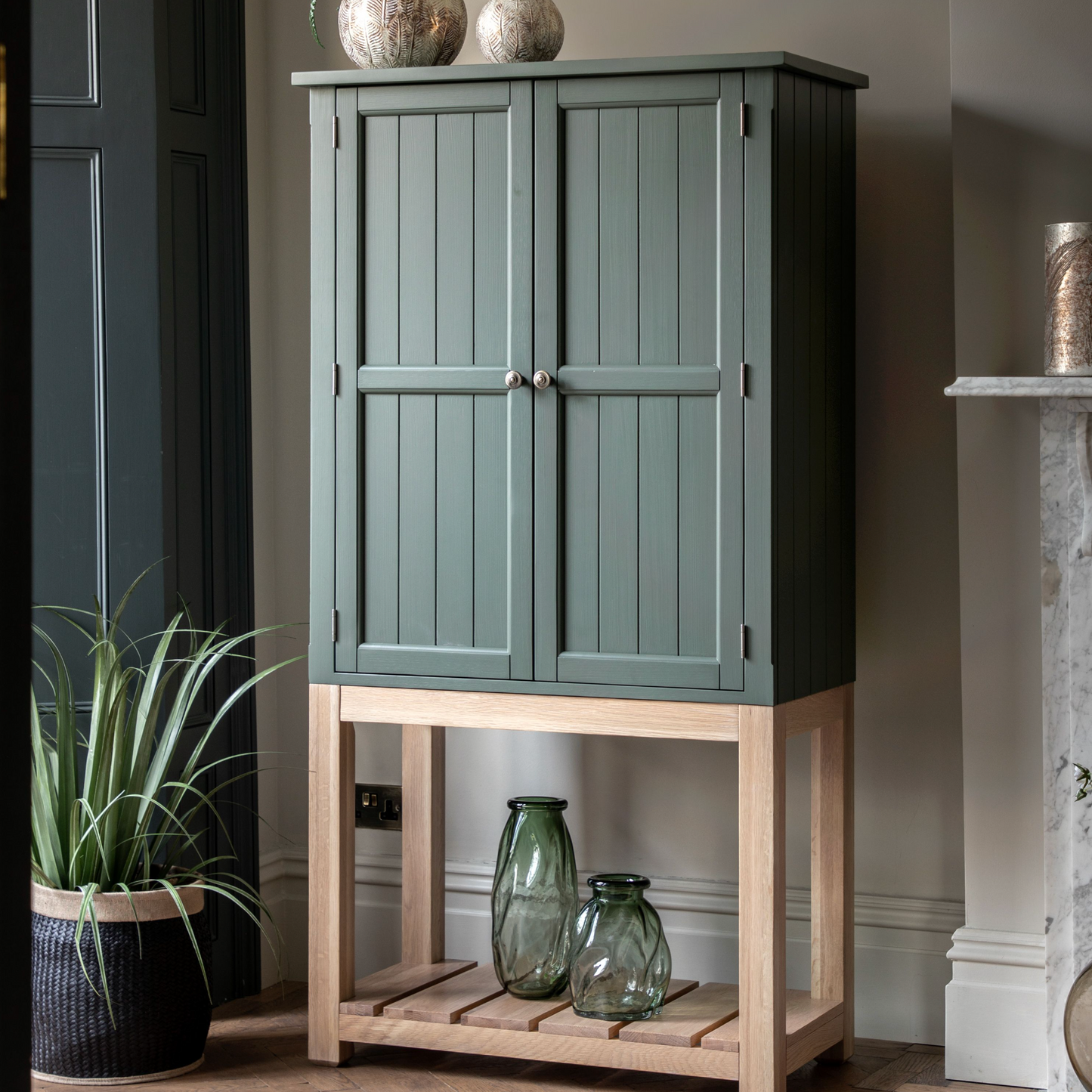 A Buckland 2 Door Storage Cupboard in Moss (w)900x(d)450x(h)1700mm from Kikiathome.co.uk, perfect for interior decor and home furniture