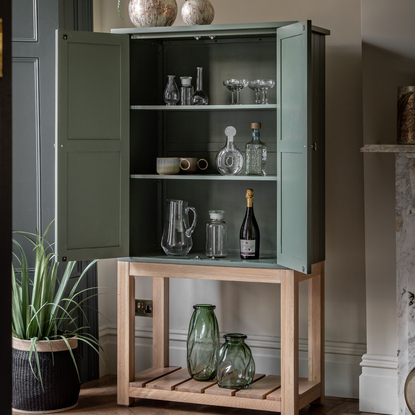 A Buckland 2 Door Storage Cupboard in Moss (w)900x(d)450x(h)1700mm for home furniture and interior decor from Kikiathome.co.uk in a