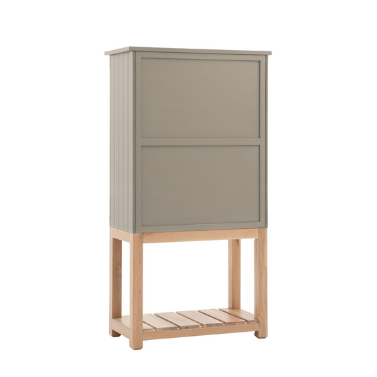 A Buckland 2 Door Storage Cupboard in Prairie (w)900x(d)450x(h)1700mm from Kikiathome.co.uk with a wooden shelf on top for home