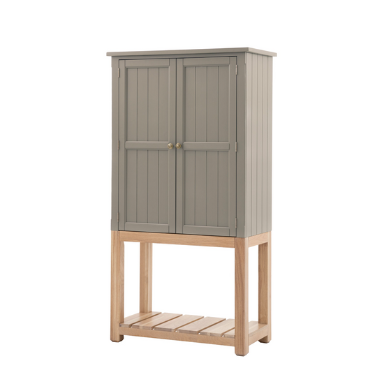 A Buckland 2 Door Storage Cupboard in Prairie with a wooden shelf, perfect for interior decor and home furniture.