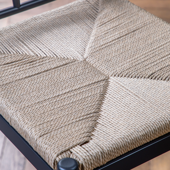A close up of a home furniture item, the Buckland Bar Stool in Meteor 2pk by Kikiathome.co.uk, featuring a woven seat.