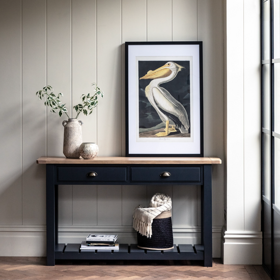 An Interior decor home furniture piece - the Buckland Console Table in Meteor from Kikiathome.co.uk - features a pelican print.