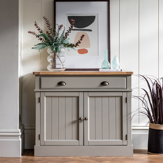 A Prairie interior decor piece, the Buckland Sideboard in a living room from Kikiathome.co.uk offers ample storage and sophisticated style.