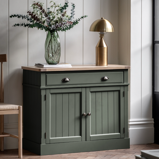 A Moss-colored Buckland sideboard in a living room from Kikiathome.co.uk, perfect for home furniture and interior decor.