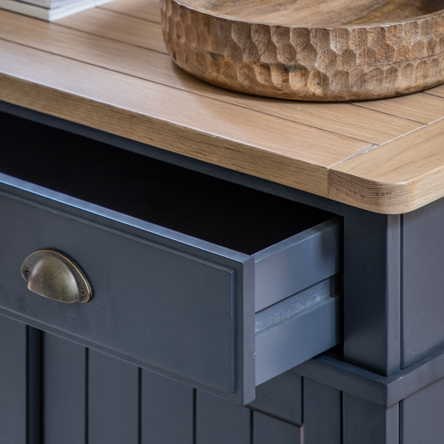 A Buckland sideboard in Meteor from Kikiathome.co.uk, serving as interior decor with a bowl on top.