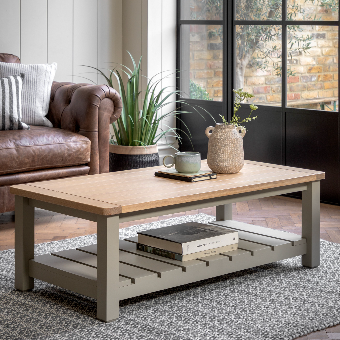A Prairie coffee table from Kikiathome.co.uk in a living room with a large window, enhancing the home interior decor.