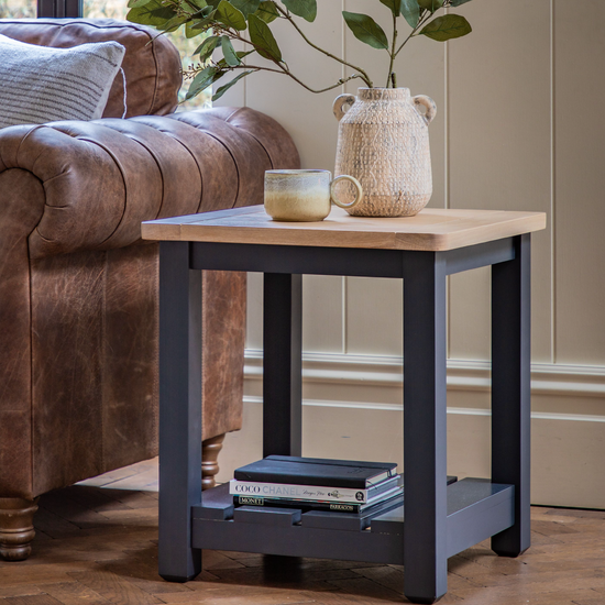 A Buckland Side Table in Meteor from Kikiathome.co.uk with a book on top, adding style to your interior decor.