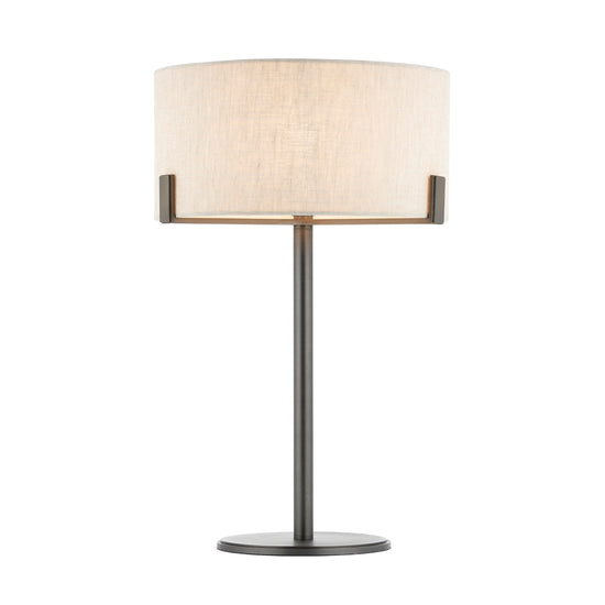 A Hayfield Table Lamp in Bronze/Natural for interior decor with a linen shade.