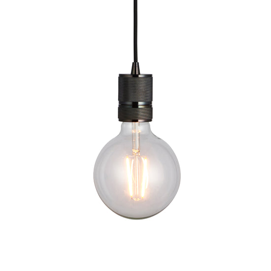 An Urban Pendant Light in Black Chrome hanging from a black cord, perfect for interior decor and home furniture.