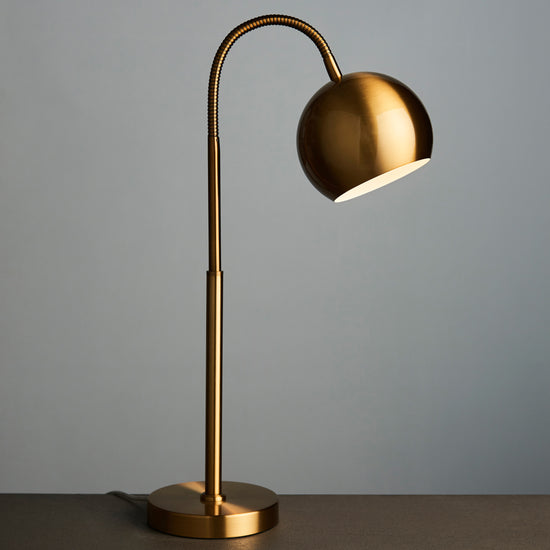 A Beesand Table Lamp Bronze for interior decor on a table.