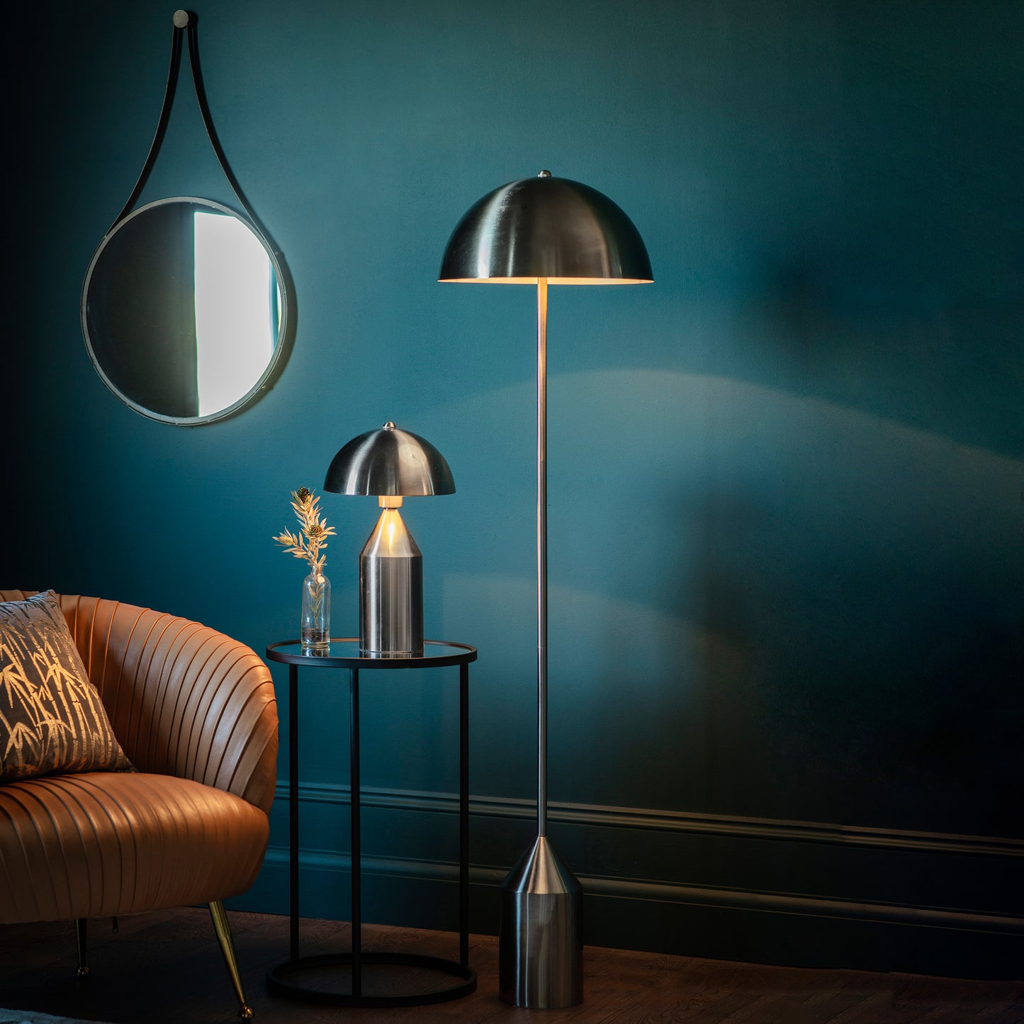 A Nova Table Lamp by Kikiathome.co.uk and a mirror in an interior decor with blue walls.