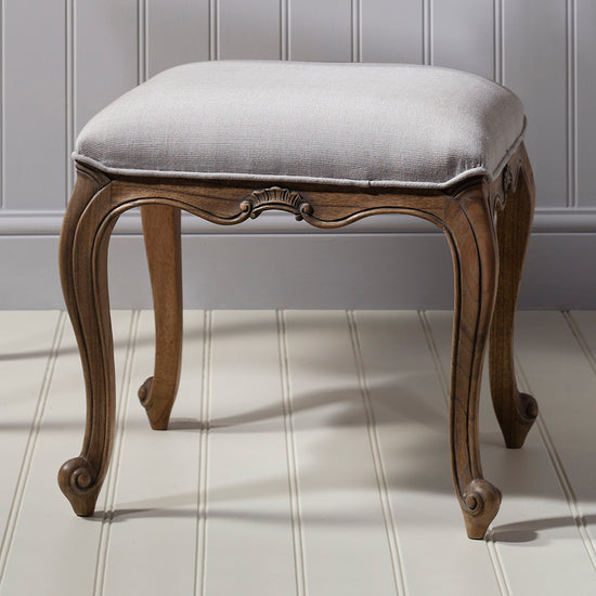 A weathered dressing stool with an upholstered seat by Kikiathome.co.uk, perfect for home furniture and interior decor.