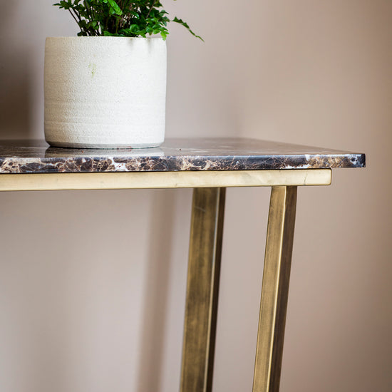 A Moreleigh Console Table Marble from Kikiathome.co.uk used for interior decor and home furniture.