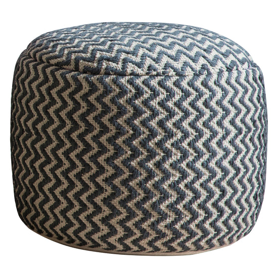 A Kidley Pouffe Grey 500x500x400mm from Kikiathome.co.uk with a blue and white chevron pattern, perfect for interior decor.