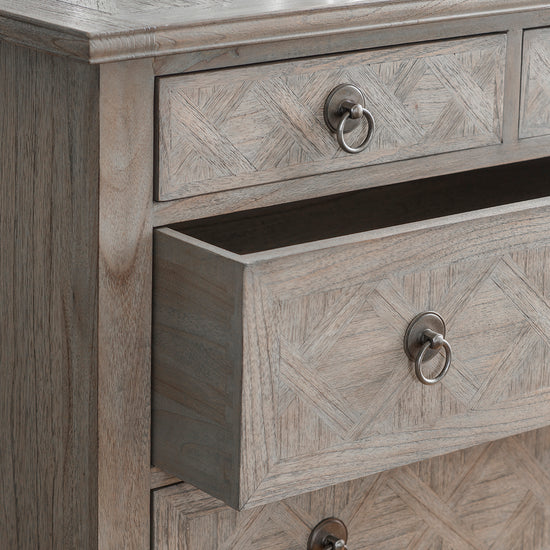 A Belsford 5 Drawer Chest 900x450x1019mm with metal handles for interior decor.