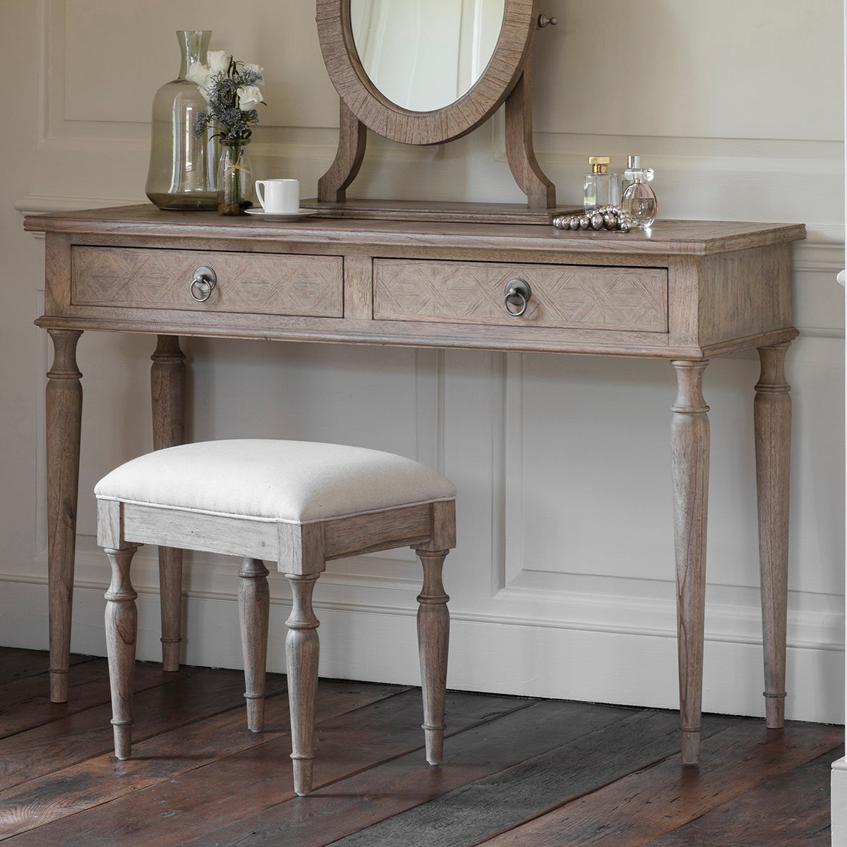 A Belsford Dressing Table 1200x400x800mm with a mirror and stool for interior decor.