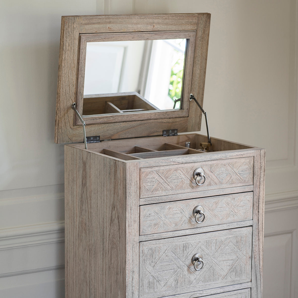 A Belsford 5 Drawer Lingerie Chest with a mirror on top for interior decor or home furniture needs.