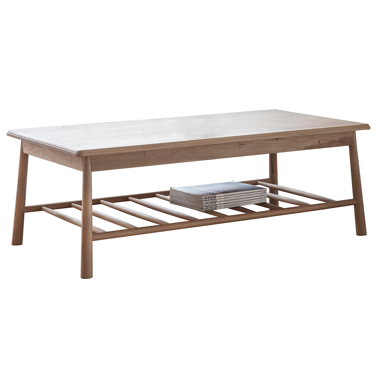 A Tigley Rect Coffee Table 1200x650x425mm with a magazine, perfect for interior decor and home furniture.