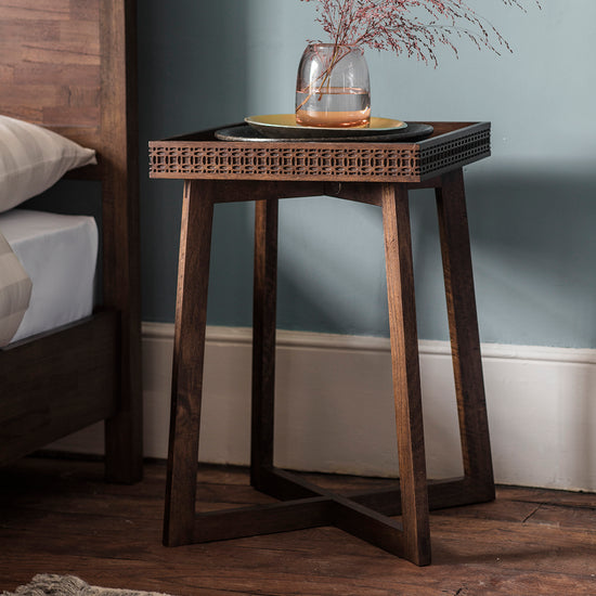 A Dartington Retreat Bedside Table with a vase, perfect for interior decor and home furniture.