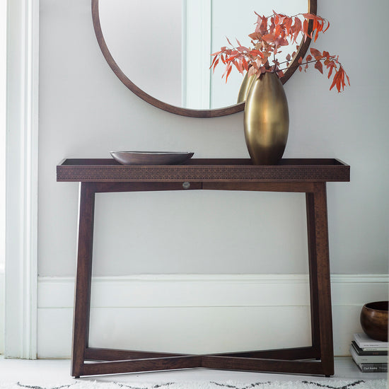 A Dartington Retreat Console Table 1100x400x800mm with a vase and a mirror for home furniture and interior decor from Kikiathome.co.uk.