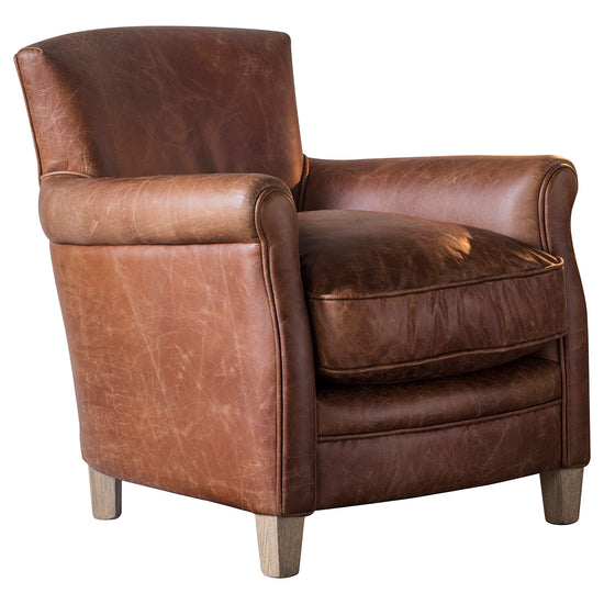 A vintage brown leather chair with wooden legs for home furniture and interior decor from Kikiathome.co.uk.