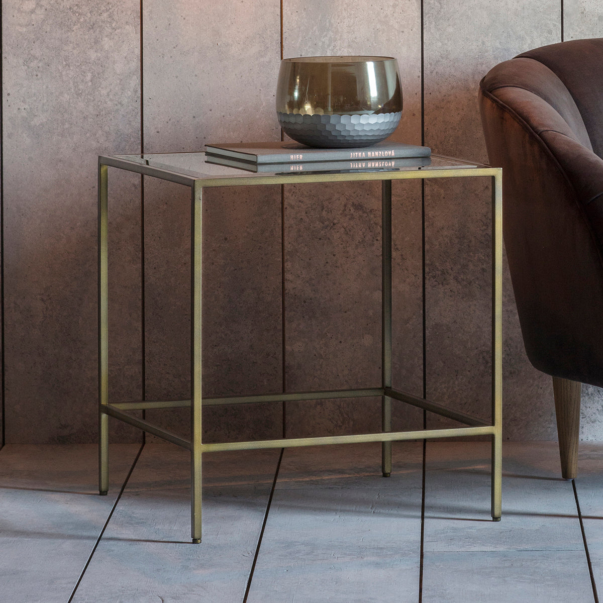 A bronze Engleborne side table with glass top, perfect for interior decor and home furniture.