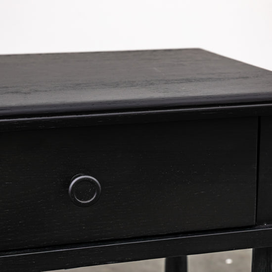 A close-up nightstand from Kikiathome.co.uk with a drawer, perfect for interior decor and home furniture.