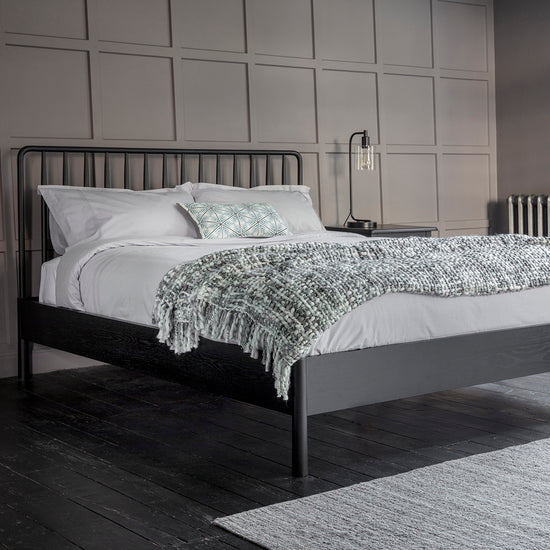 A Tigley 5' Spindle Bed Black by Kikiathome.co.uk incorporated into bedroom interior decor.